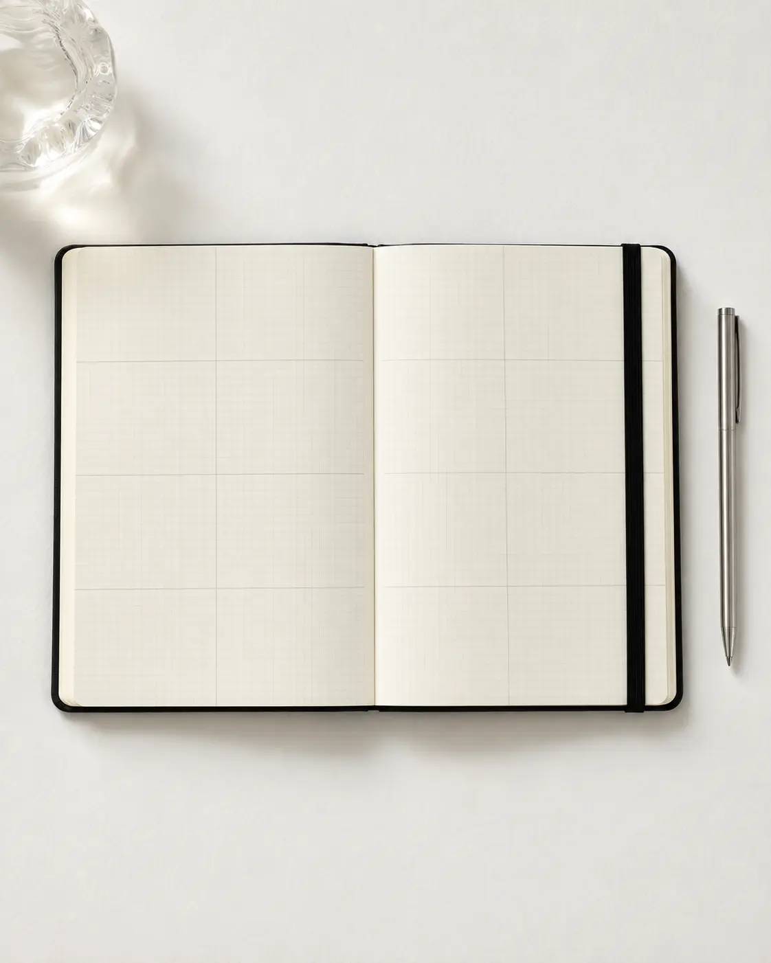 Open diary showing a considered lay-flat page design